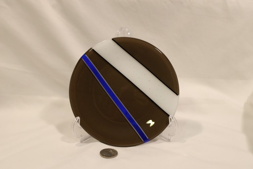 small chocolate plate with white and blue stripes